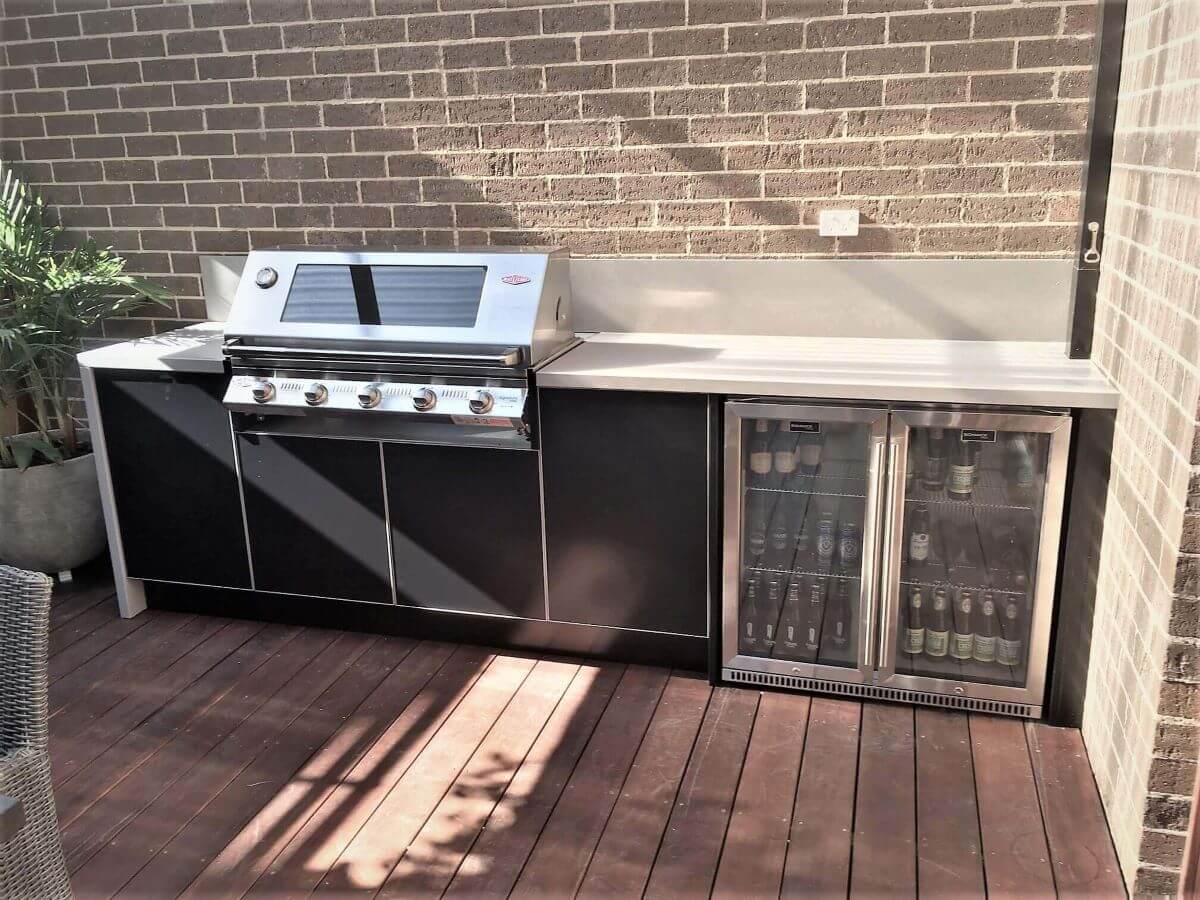 LimeTree Alfresco Beefeater Signature 3000S 5 Bnr BBQ with Matte Black cabinets and Dekton Sirocco benchtops