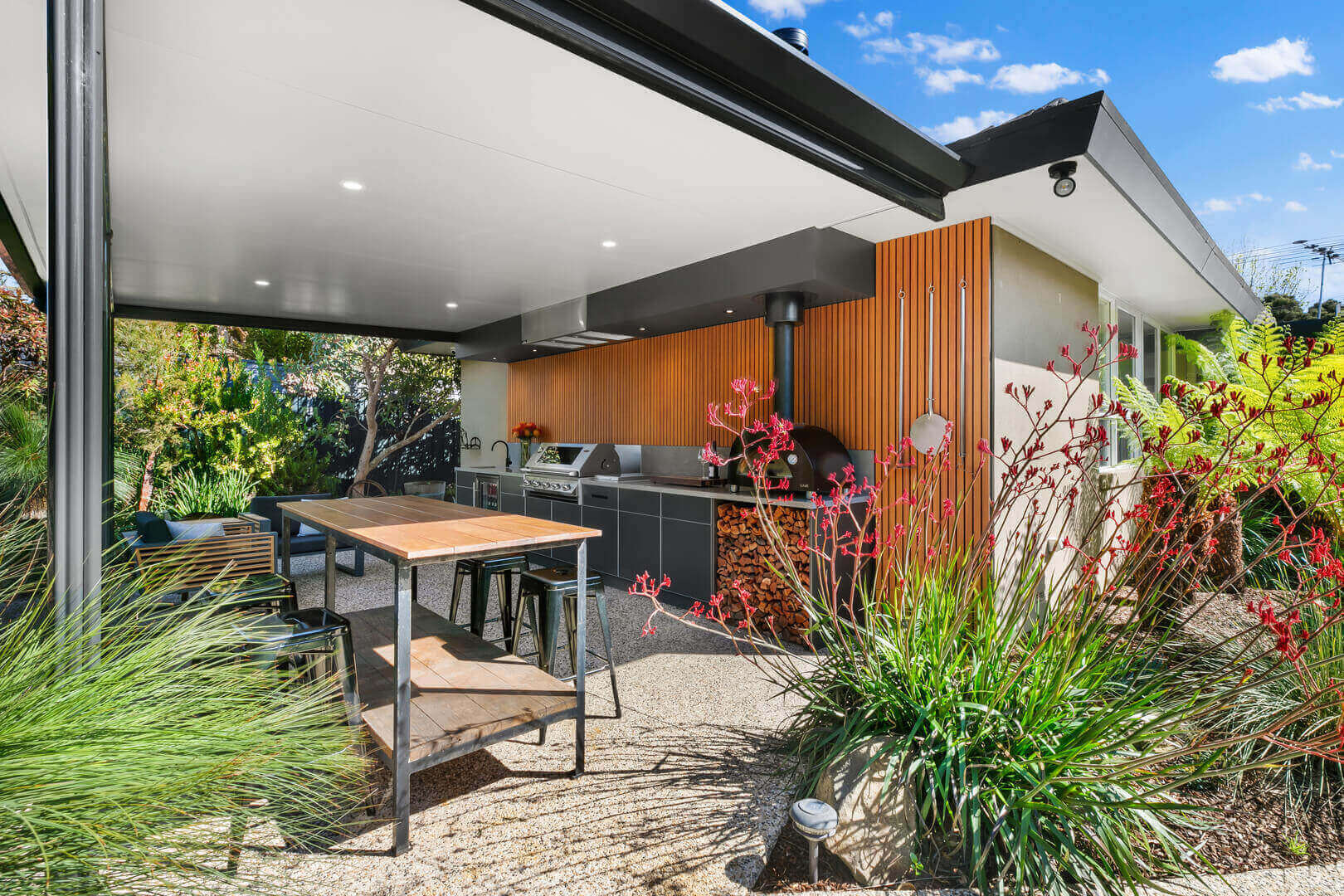 Outdoor alfresco dining surrounded by greenery